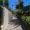 House with cozy garden BBQ and free parking