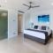 Edge 5 Oceanfront 3-Bedroom Apartment - Featuring an Infinity Pool, Spa Bath, Buggy and Valet Service - Isla Hamilton