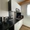 A MANDRIA, appartements avec cuisine 30m2, patio, vue Montagnes et citadelle, 5 minutes à pied du centre ville et des rivières