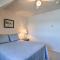 Lakefront Bellaire Getaway with Kayaks, Dock and Grill
