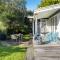 The Little Blue Bach - Waikanae Beach Holiday Home