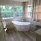 Farm House stay with soaking tub and hot tub barn