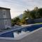 Apartments Zanic with private swimming pool and sea view