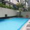 Stay at The Olympia, PRIME MAKATI LOCATION Near Ayala Triangle Gardens -FREE WIFI and Pool Use - Manila