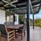 Relax in the spa with views opposite Lake Eildon