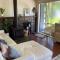 Relax in the spa with views opposite Lake Eildon