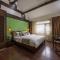 Lijiang Gui Yuan Tian Ju Guesthouse - Lijiang