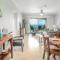 Elegant Oceanview Condo with Spacious Open-Concept Floor Plan and Inviting Beach Design