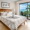 Elegant Oceanview Condo with Spacious Open-Concept Floor Plan and Inviting Beach Design