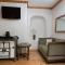 Au Cheval Blanc - appartements et chambres d'hôtes photo 17