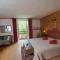 Au Cheval Blanc - appartements et chambres d'hôtes photo 11