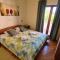 Oasis apartment with sea view and garden
