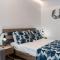 POUNEDES LUXURY SUITES