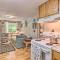 Vintage Creekside Cottage with Hot Tub and Grill!