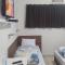 Pousada Quarto completo ar,wi fi e garagem gratuita