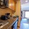 Comfortable Studio Efficiency Unit with Balcony over Mountaineer Square condo