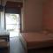 Spacious triple room a stones throw from the sea