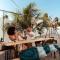 The Palm Leaf Apartments