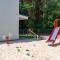 Apartamenty w sam las by KLIF Ustka - apartament na parterze z tarasem i parkingiem