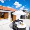 Villa Pietra- Modern rustic poolside oasis