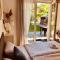 GartenLoft mit Outdoor Whirlpool und Garten