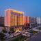 Vienna International Hotel Xinyang Yangshan New District - Xinyang