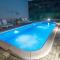 Village holiday apartman with heated pool Maslina - Kostanje