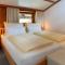 Pension Hinterholzer Apartments und Zimmer