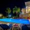 Zeus Sublime Villa 5 bedrms HEATED POOL by Coral Sun Villas,