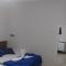 Pousada Quarto com frigobar,ar e garagem gratuita