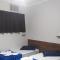 Pousada Quarto com frigobar,ar e garagem gratuita