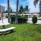 The Beach House at Seascape Steps from the Beach, Marina and Shops! - West Palm Beach