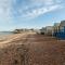 Home with sea views next to the beach!