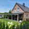 Bild Leaf&Stay Ferienhaus auf Usedom mit optionaler Wallbox