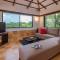 Classique Woods by StayVista with Pool, Lawn with Gazebo & Bar, Indoor Fun - Karjat