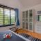 Classique Woods by StayVista with Pool, Lawn with Gazebo & Bar, Indoor Fun - Karjat
