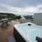 Lloret- Modern retreat with Castle views and private Hot Tub