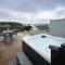 Lloret- Modern retreat with Castle views and private Hot Tub