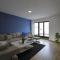 Blue apartment over Prizren roofs
