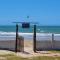 Studio pé na areia com 2 quartos, sala e cozinha