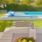 Holiday home with swimming pool