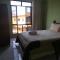 Paradise Hostel e Flats