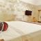 Antiche Mura Apartments Bianco di Puglia cucina 1 camera da letto più divano letto