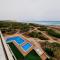 Pinada Beach IV new & comfort. apartment, 1st line to the beach, sunterrace+pool