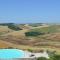 Holiday apartment with swimming pool, strade bianche, swimming pool, view