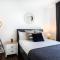 1-Bedroom Apartment with a Private Garden, beach 5-min walk
