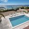 Beachfront Apartments Tolo with Pool - Новаля