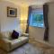 Cheerful One bedroom cottage with parking space.