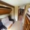 Water Front Tracer RV by Glampers Camp