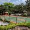 StayVistas Shantam House - Dive into relaxation with a pool and tennis lawn